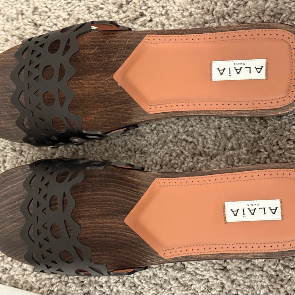 Alaia Black Sandals with Textural Patterns